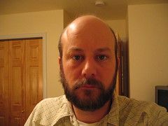 the author with a fairly kempt beard